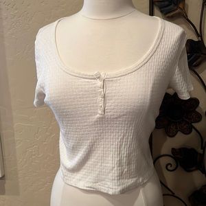 This cute white tee could be worn with literally anything!